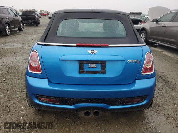 2011 MINI Convertible S с VIN WMWZP3C52BTX82943, выставлен на аукционе Copart как лот 81586044 с пробегом 145 543 миль миль и Списание • Salvage title. История ставок и продаж доступна на DreamBid. Изображение 6.