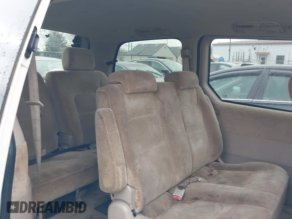 2004 Kia Sedona LX with VIN KNDUP131446537660, listed as a IAAI auction lot 41526183 with 282,891 mi miles. Bid and sale history available at carsss.com. Image 8.