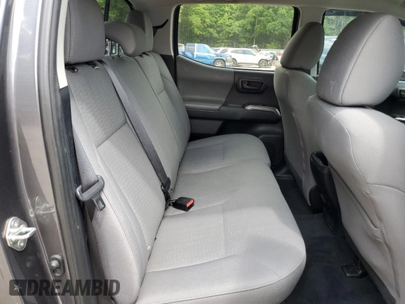 2018 Toyota Tacoma SR5 с VIN 5TFAZ5CN3JX071474, выставлен на аукционе Copart как лот 54677335 с пробегом 86 866 миль миль и Списание • Salvage title. История ставок и продаж доступна на DreamBid. Изображение 10.