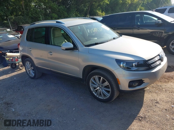 2012 Volkswagen Tiguan SE with VIN WVGBV7AX7CW580259, listed as a IAAI auction lot 42719624 with 94,710 mi miles and . Bid and sale history available at DreamBid. Image 1.