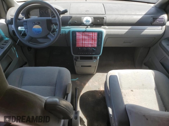 2005 Ford Freestar SE с VIN 2FMZA51655BA55923, выставлен на аукционе Copart как лот 50077735 с пробегом Не указан миль и Списание • Salvage title. История ставок и продаж доступна на DreamBid. Изображение 8.