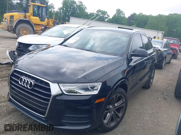 2016 Audi Q3 Premium Plus with VIN WA1BFCFSXGR022587, listed as a IAAI auction lot 42133288 with 141,609 mi miles. Bid and sale history available at carsss.com. Image 14.