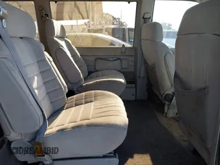 1991 GMC Safari z VIN 1GKDM19Z2MB530997, wystawiony jako IAAI lot #42134837 z przebiegiem 195 085 mil mil oraz . Historia ofert i sprzedaży dostępna na DreamBid. Obrazek 8.