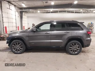 2016 Jeep Grand Cherokee Limited 75th Anniversary with VIN 1C4RJFBG2GC349154, listed as a IAAI auction lot 41392239 with 135,627 mi miles and . Bid and sale history available at DreamBid. Image 14.