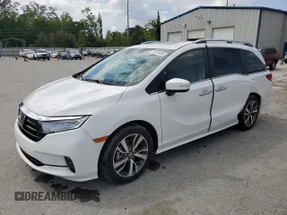 2024 Honda Odyssey Touring with VIN 5FNRL6H81RB055275, listed as a Copart auction lot 52676455 with 13,111 mi miles and Salvage title. Bid and sale history available at DreamBid. Image 1.
