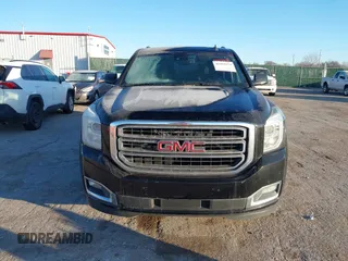 2015 GMC Yukon XL SLT with VIN 1GKS1HKC3FR250207, listed as a IAAI auction lot 41424234 with 183,233 mi miles. Bid and sale history available at carsss.com. Image 12.