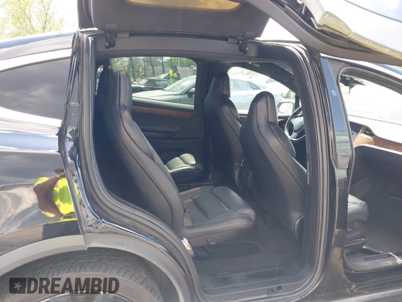 2019 Tesla Model X 75D with VIN 5YJXCBE21KF180203, listed as a IAAI auction lot 42190255 with 114,294 mi miles and . Bid and sale history available at DreamBid. Image 8.