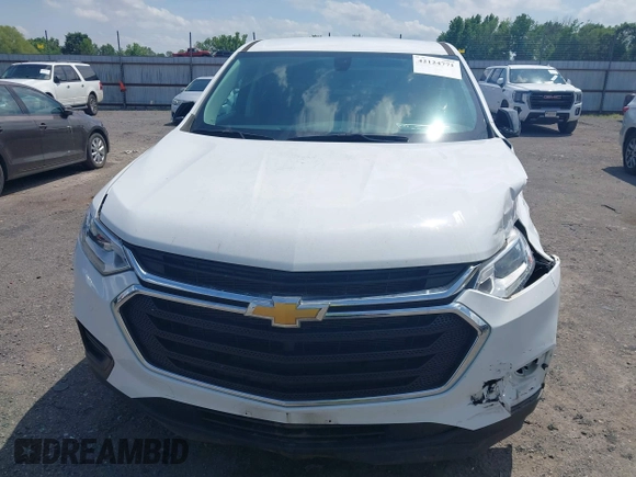 2020 Chevrolet Traverse LS z VIN 1GNERFKW8LJ262886, wystawiony jako IAAI lot #42124771 z przebiegiem 22 357 mil mil oraz . Historia ofert i sprzedaży dostępna na DreamBid. Obrazek 6.