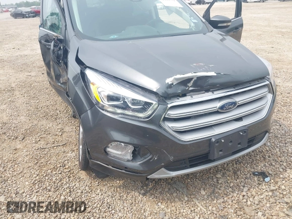 2019 Ford Escape Titanium with VIN 1FMCU0J97KUA34281, listed as a IAAI auction lot 42409579 with 55,400 mi miles and . Bid and sale history available at DreamBid. Image 6.