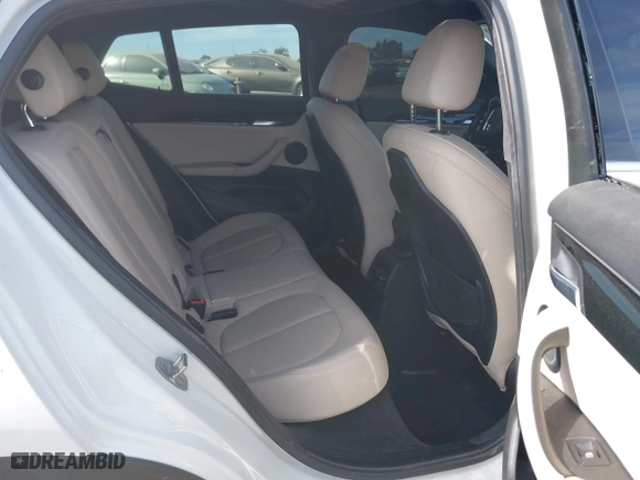 2020 BMW X2 sDrive28i with VIN WBXYH9C01L5P15004, listed as a IAAI auction lot 41128060 with 86,052 mi miles. Bid and sale history available at carsss.com. Image 8.