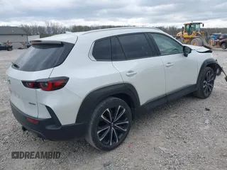 2023 Mazda CX-50 S Premium Plus with VIN 7MMVABEM7PN108865, listed as a IAAI auction lot 42049215 with 33,285 mi miles and . Bid and sale history available at DreamBid. Image 4.