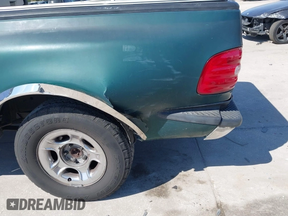 1999 Ford F-150 XL with VIN 2FTRX07W1XCA67223, listed as a IAAI auction lot 41661743 with 1 mi miles. Bid and sale history available at carsss.com. Image 6.