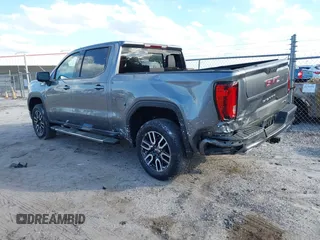 2021 GMC Sierra 1500 AT4 with VIN 1GTU9EET8MZ271591, listed as a IAAI auction lot 41566653 with 49,923 mi miles. Bid and sale history available at carsss.com. Image 3.