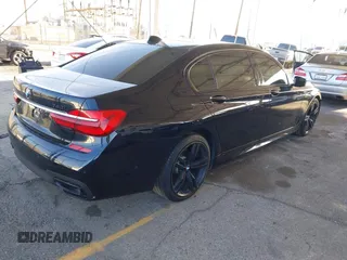 2019 BMW 7 Series 740i with VIN WBA7E2C58KB218419, listed as a IAAI auction lot 41831080 with 97,752 mi miles and . Bid and sale history available at DreamBid. Image 4.