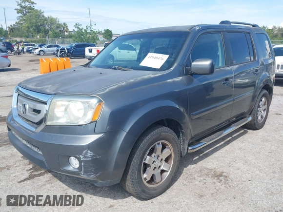 2011 Honda Pilot EX with VIN 5FNYF3H4XBB001140, listed as a IAAI auction lot 41940476 with 254,136 mi miles and . Bid and sale history available at carsss.com. Image 23.