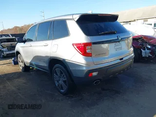 2021 Honda Passport EX-L with VIN 5FNYF8H54MB042677, listed as a IAAI auction lot 40732860 with 63,698 mi miles and . Bid and sale history available at DreamBid. Image 3.