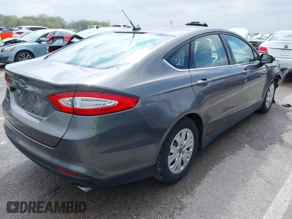 2014 Ford Fusion S with VIN 3FA6P0G70ER377725, listed as a IAAI auction lot 42007410 with 56,552 mi miles and . Bid and sale history available at carsss.com. Image 4.