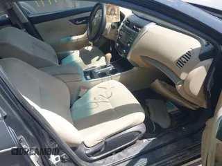 2015 Nissan Altima 2.5 S with VIN 1N4AL3AP2FC177218, listed as a IAAI auction lot 42144941 with 177,493 mi miles. Bid and sale history available at carsss.com. Image 5.