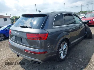 2018 Audi Q7 Prestige with VIN WA1VAAF75JD036199, listed as a IAAI auction lot 42557507 with 104,644 mi miles and . Bid and sale history available at DreamBid. Image 4.