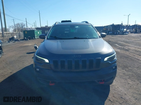 2019 Jeep Cherokee Trailhawk with VIN 1C4PJMBX6KD410391, listed as a IAAI auction lot 41821355 with 79,473 mi miles and . Bid and sale history available at DreamBid. Image 13.