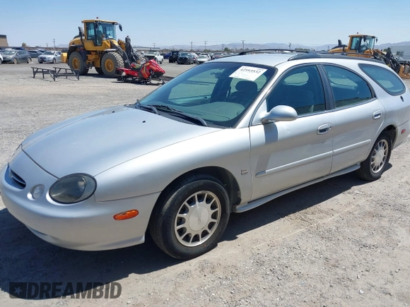 1999 Ford Taurus SE with VIN 1FAFP58S8XA118834, listed as a IAAI auction lot 42593532 with 141,242 mi miles and . Bid and sale history available at DreamBid. Image 2.