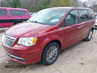 2014 Chrysler Town & Country Touring L with VIN 2C4RC1CGXER307492, listed as a IAAI auction lot 42021290 with 98,845 mi miles and . Bid and sale history available at carsss.com. Image 22.