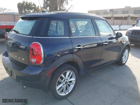 2014 MINI Cooper Countryman with VIN WMWZB3C50EWR42268, listed as a IAAI auction lot 41845750 with NaN miles. Bid and sale history available at carsss.com. Image 4.