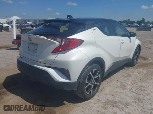 2019 Toyota C-HR XLE z VIN JTNKHMBX8K1061351, wystawiony jako IAAI lot #42053354 z przebiegiem 76 000 mil mil oraz . Historia ofert i sprzedaży dostępna na DreamBid. Obrazek 4.