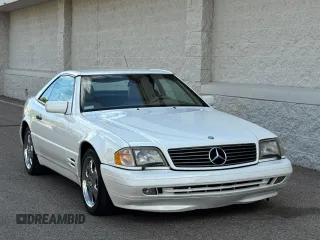 1998 Mercedes-Benz SL 500 with VIN WDBFA67F7WF158652, listed as a Copart auction lot 65480405 with 91,401 mi miles and Clean title. Bid and sale history available at DreamBid. Image 1.