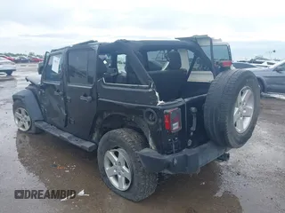 2014 Jeep Wrangler Unlimited Sport with VIN 1C4BJWDGXEL294965, listed as a IAAI auction lot 41908152 with 243,546 mi miles and . Bid and sale history available at DreamBid. Image 3.