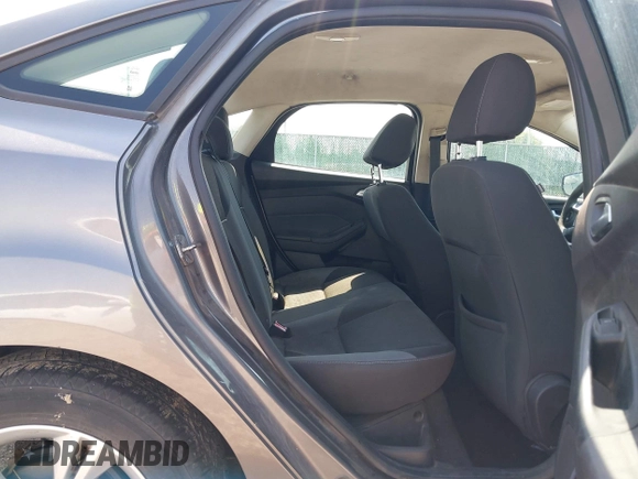 2013 Ford Focus SE with VIN 1FADP3F25DL337961, listed as a IAAI auction lot 42410460 with 143,446 mi miles and . Bid and sale history available at DreamBid. Image 8.