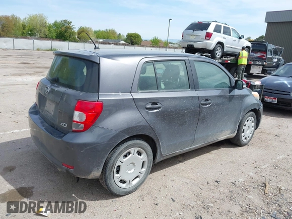 2010 Scion xD with VIN JTKKU4B42A1001367, listed as a IAAI auction lot 42085217 with 120,359 mi miles. Bid and sale history available at carsss.com. Image 4.