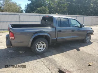 2003 Dodge Dakota Sport with VIN 1D7HL38N43S184708, listed as a Copart auction lot 73320964 with 143,398 mi miles and Salvage Title. Bid and sale history available at carsss.com. Image 3.