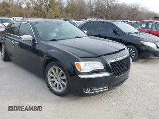 2013 Chrysler 300 with VIN 2C3CCAETXDH599153, listed as a IAAI auction lot 41738965 with 121,803 mi miles. Bid and sale history available at carsss.com. Image 1.