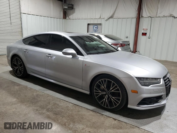 2018 Audi A7 Prestige with VIN WAU23AFC2JN051721, listed as a Copart auction lot 48557544 with 77,190 mi miles and Salvage Title. Bid and sale history available at carsss.com. Image 4.