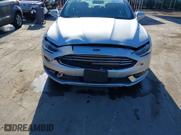 2018 Ford Fusion SE with VIN 3FA6P0LU1JR272522, listed as a IAAI auction lot 41796432 with 123,471 mi miles and . Bid and sale history available at DreamBid. Image 6.