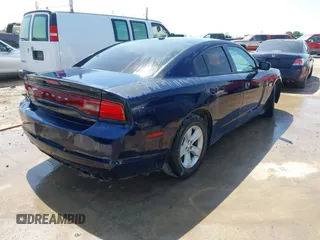 2013 Dodge Charger SE with VIN 2C3CDXBG1DH678072, listed as a IAAI auction lot 42177054 with 190,818 mi miles and . Bid and sale history available at DreamBid. Image 4.