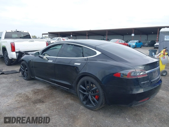 2016 Tesla Model S 90D z VIN 5YJSA1E4XGF171681, wystawiony jako IAAI lot #41836005 z przebiegiem 81 063 mil mil oraz . Historia ofert i sprzedaży dostępna na DreamBid. Obrazek 3.
