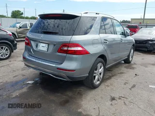 2013 Mercedes-Benz M 350 with VIN 4JGDA5HB9DA242959, listed as a IAAI auction lot 42447266 with 90,782 mi miles and . Bid and sale history available at DreamBid. Image 4.