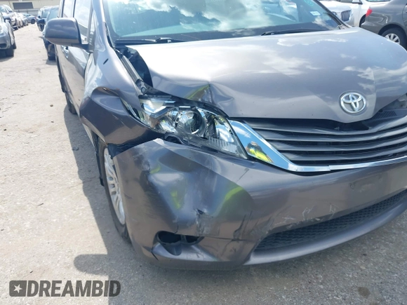 2014 Toyota Sienna XLE with VIN 5TDYK3DC0ES513076, listed as a IAAI auction lot 42724629 with 154,019 mi miles and . Bid and sale history available at DreamBid. Image 6.