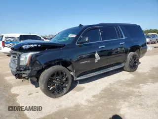 2019 GMC Yukon XL SLT with VIN 1GKS1GKC5KR327079, listed as a Copart auction lot 45928435 with 115,038 mi miles and Salvage Title. Bid and sale history available at carsss.com. Image 1.