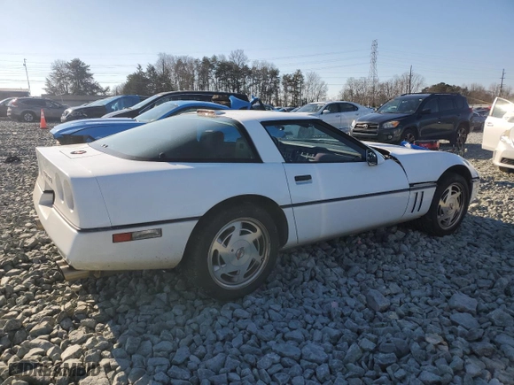 1989 Chevrolet Corvette with VIN 1G1YY2188K5117660, listed as a Copart auction lot 87948715 with 33,388 mi miles and Salvage Title. Bid and sale history available at carsss.com. Image 3.
