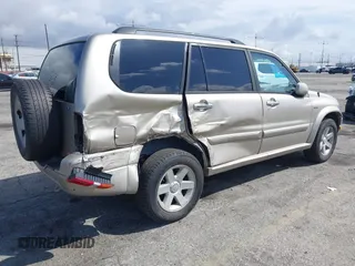 2003 Suzuki XL-7 Touring with VIN JS3TX92V634107042, listed as a IAAI auction lot 41902576 with 176,439 mi miles. Bid and sale history available at carsss.com. Image 4.
