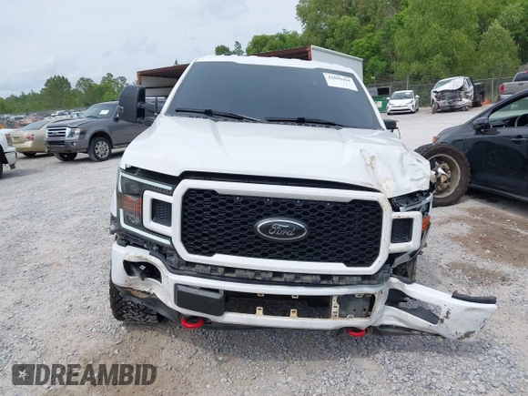 2018 Ford F-150 XL z VIN 1FTFW1E57JKF55049, wystawiony jako IAAI lot #42099491 z przebiegiem 159 170 mil mil oraz . Historia ofert i sprzedaży dostępna na DreamBid. Obrazek 13.