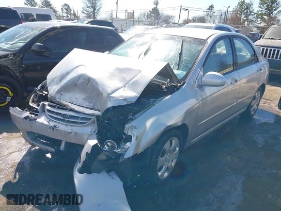 2006 Kia Spectra EX with VIN KNAFE121865313085, listed as a IAAI auction lot 41672712 with 248,959 mi miles. Bid and sale history available at carsss.com. Image 6.