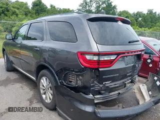 2014 Dodge Durango SXT with VIN 1C4RDHAG3EC543256, listed as a IAAI auction lot 42442851 with 73,609 mi miles and . Bid and sale history available at DreamBid. Image 3.