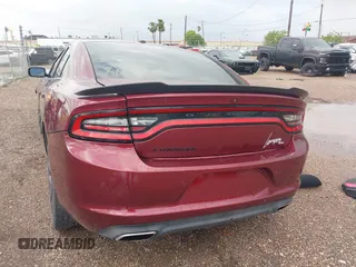 2020 Dodge Charger SXT with VIN 2C3CDXBG2LH136073, listed as a IAAI auction lot 41900921 with 55,747 mi miles and . Bid and sale history available at carsss.com. Image 3.