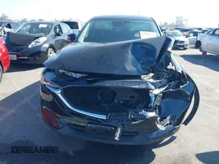 2017 Mazda CX-5 Touring with VIN JM3KFACL2H0146213, listed as a IAAI auction lot 41626112 with 77,829 mi miles and . Bid and sale history available at carsss.com. Image 12.