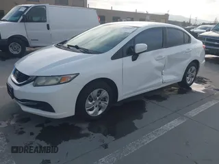 2014 Honda Civic LX with VIN 19XFB2F52EE200749, listed as a IAAI auction lot 42004489 with 213,818 mi miles and . Bid and sale history available at DreamBid. Image 2.