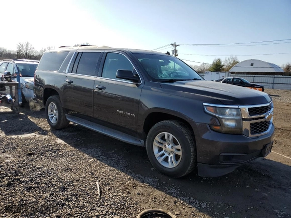 2015 Chevrolet Suburban LS with VIN 1GNSCHKC3FR159676, listed as a Copart auction lot 84606074 with 264,234 mi miles and Clean Title. Bid and sale history available at carsss.com. Image 4.